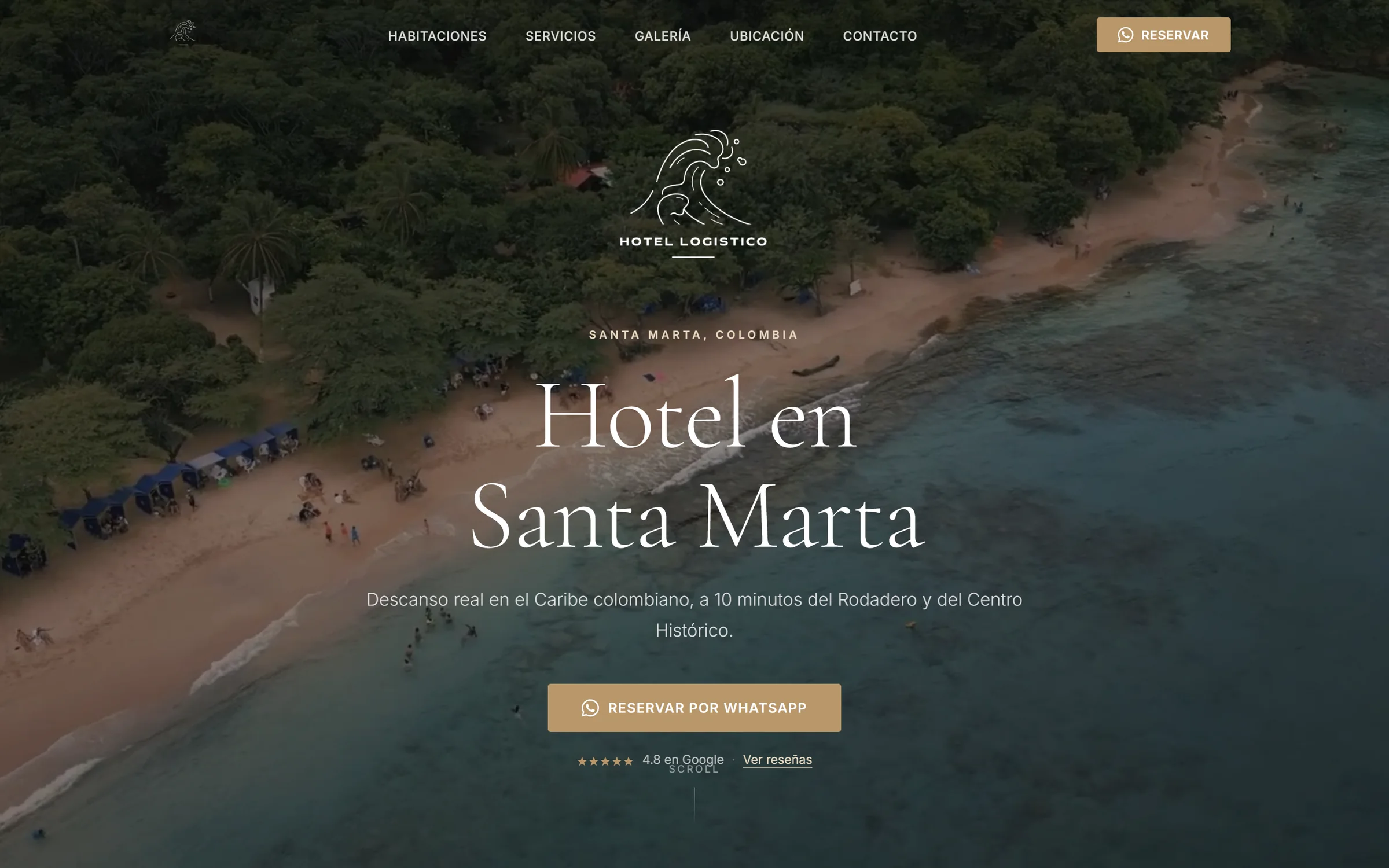 Hotel Logístico home page: aerial video of a Santa Marta beach behind the headline “Hotel en Santa Marta” and a WhatsApp booking button.
